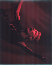 Roger Waters performing on stage photo print, arms raised.