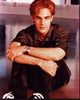 James Van Der Beek sitting on ground photo print