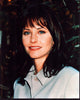 Courtney Cox photo print in tan jacket, perfect for home decor.