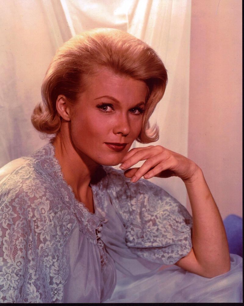 Pat Priest photo print in lace pajamas with hand on chin