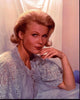 Pat Priest photo print in lace pajamas with hand on chin