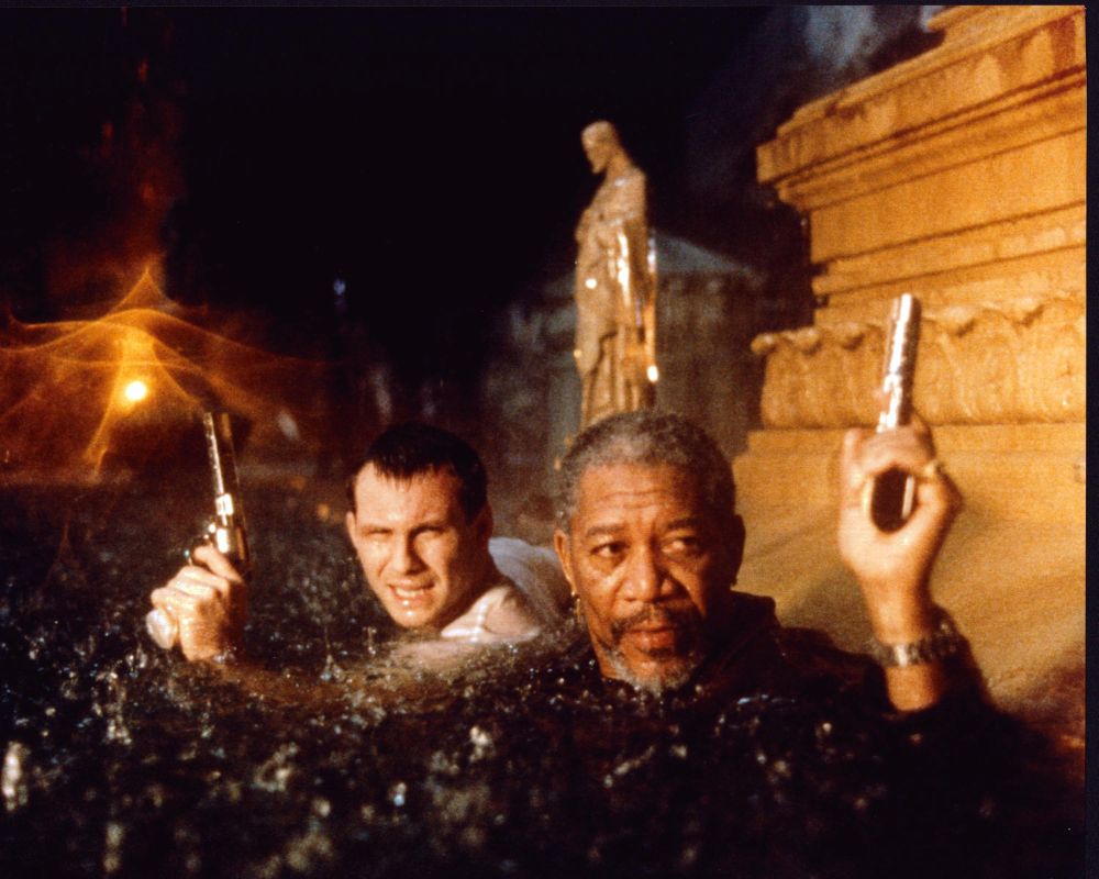 Christian Slater and Morgan Freeman walking through water in Hard Rain photo print.