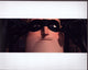Craig T. Nelson as Mr. Incredible putting on his mask - Photo Print