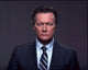 Robert Patrick photo print in gray suit with blue striped tie.