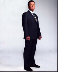 Robert Patrick wearing a badge in a navy suit photo print