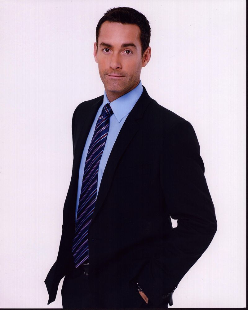 Jay Harrington photo print in suit with hands in pockets
