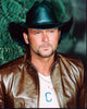 Tim McGraw photo print in brown leather jacket and black cowboy hat.