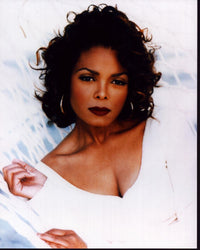 Janet Jackson in white photo print capturing her elegance and style.