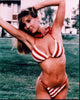Kathleen Kinmont in a red and white bikini photo print.