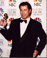 John Travolta in Tuxedo holding Golden Globe Award photo print
