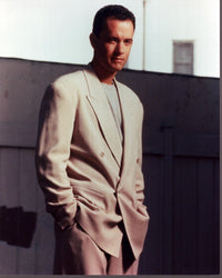 Tom Hanks in a tan suit photo print, hands in pockets, casual elegance.