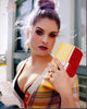 Kelly Osbourne in a multi-colored plaid sweater photo print