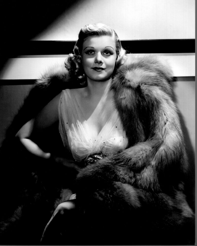 Black and white photo print of Jean Harlow in sheer dress and fur coat