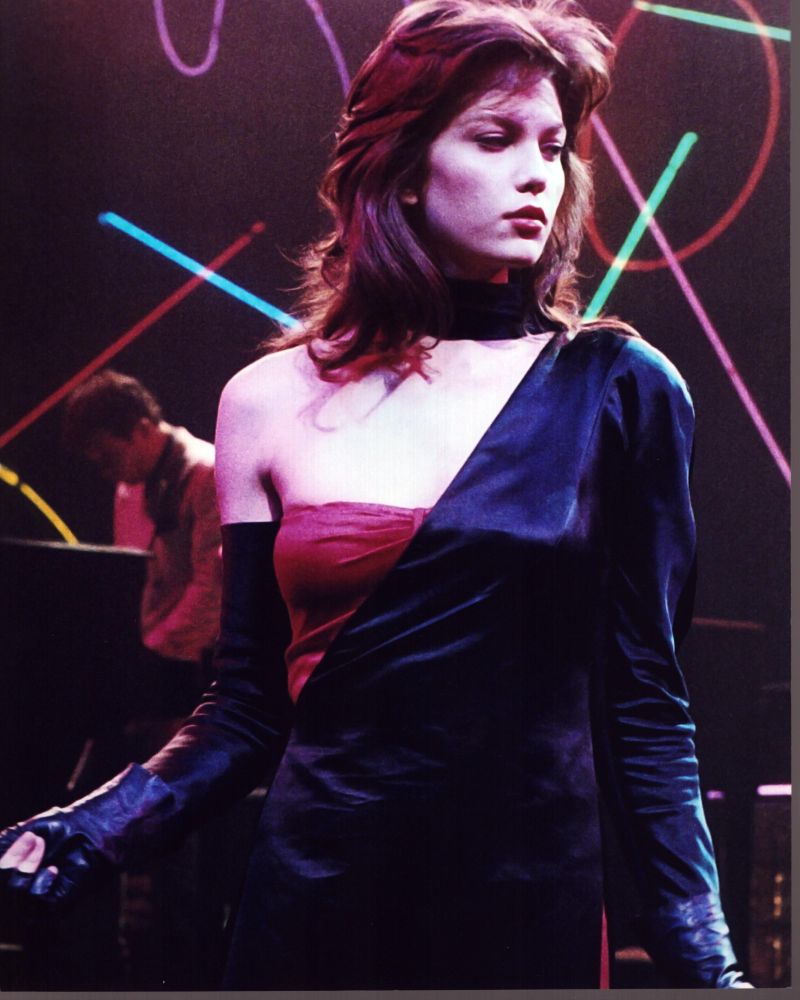 Diane Lane performing on stage in a red and black outfit - photo print