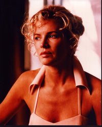 Photo print of Kim Basinger in halter top with collar, capturing Hollywood glamour.