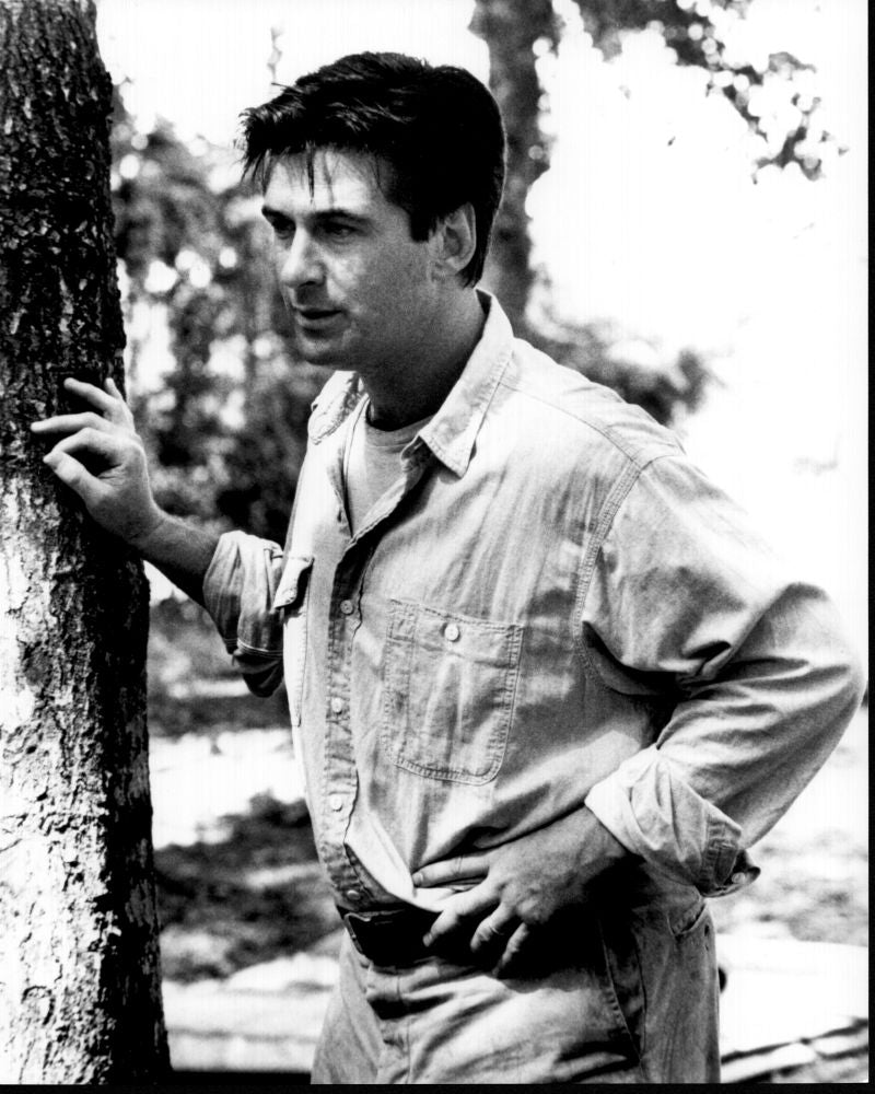 Alec Baldwin leaning on a tree in black and white photo print