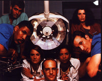 E.R. Cast Under Surgical Light Photo Print showcasing the iconic medical drama cast.