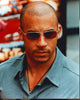 Vin Diesel in gray shirt and sunglasses photo print.