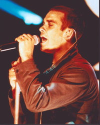 Robbie Williams Photo Print - Singing On Stage in Brown Jacket (8x10)