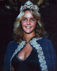 Erin Murphy wearing a cape and crown photo print
