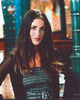 Soleil Moon Frye photo print in black leather and sheer outfit, hands on hips.