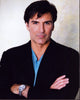 Vincent Irizarry Arms Crossed Photo Print showcasing confidence and elegance.