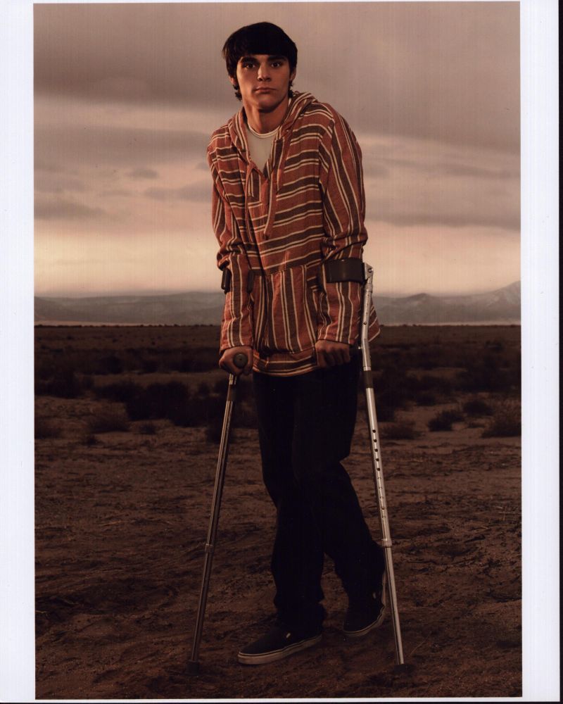 RJ Mitte in red striped sweatshirt desert photo print