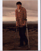 RJ Mitte in red striped sweatshirt desert photo print