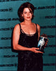 Neve Campbell holding MTV Movie Award photo print