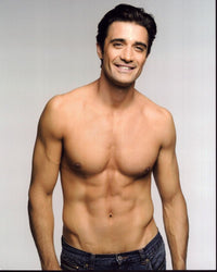 Gilles Marini shirtless photo print on gray background.