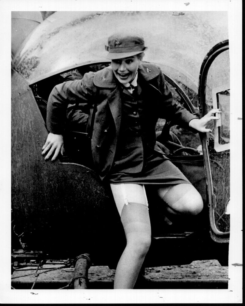 Sally Kellerman getting out of helicopter in M*A*S*H black and white photo print