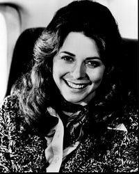 Lindsay Wagner smiling in a sweater and scarf black and white photo print.