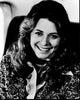 Lindsay Wagner smiling in a sweater and scarf black and white photo print.