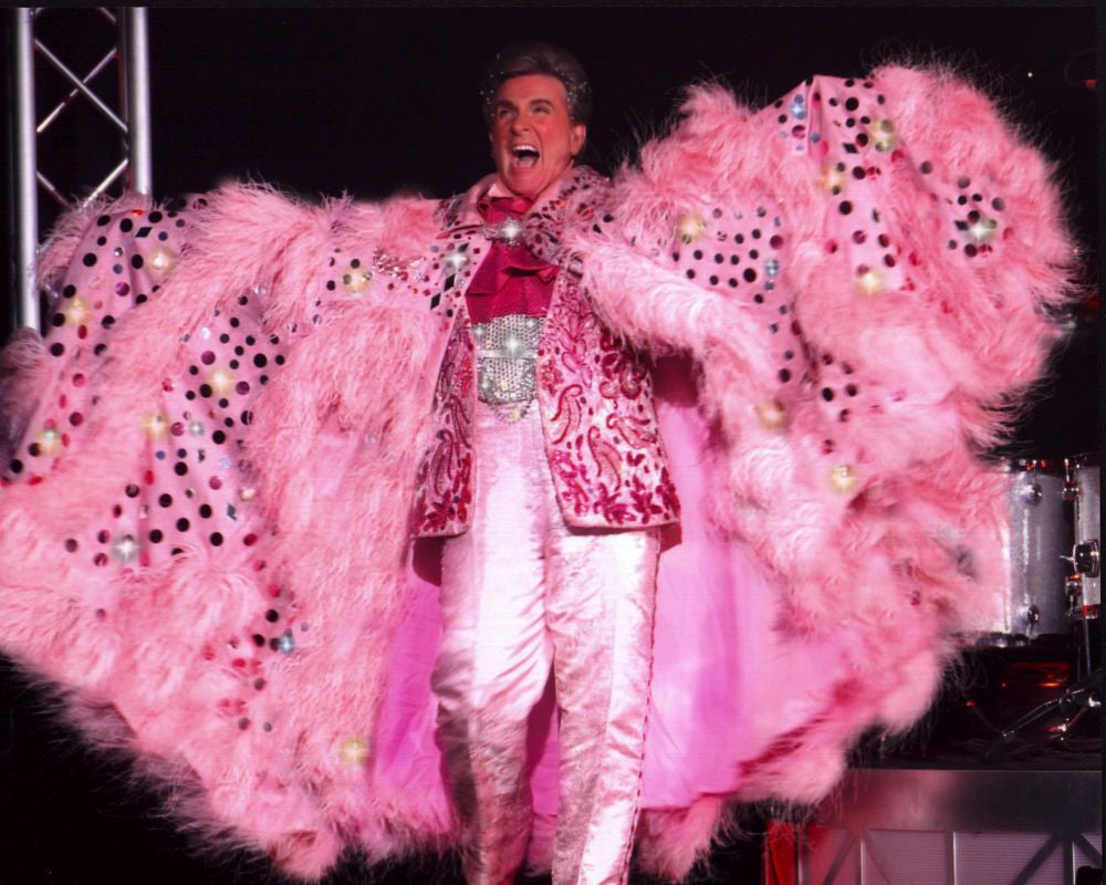 Liberace in Pink Suit with Feather Cape Photo Print