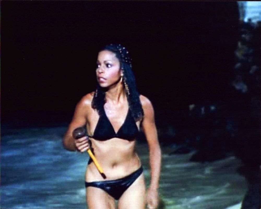 Lynne Moody wearing a black bikini from Magnum P.I. photo print