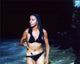 Lynne Moody wearing a black bikini from Magnum P.I. photo print