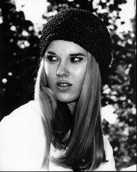 Black and white close-up photo print of Lee Purcell wearing a knit hat