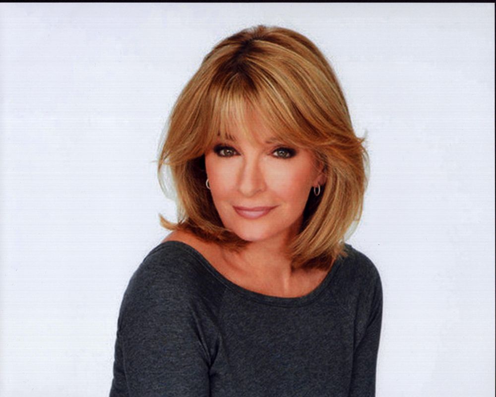 Deidre Hall headshot photo print in gray top.