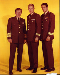 Voyage To The Bottom Of The Sea photo print featuring Richard Basehart, Robert Dowdell, and David Hedison with a yellow background.