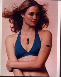 Cybill Shepherd in blue bikini photo print, capturing classic Hollywood beauty.