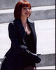 Amanda Seyfried in a black coat and gloves from In Time photo print.
