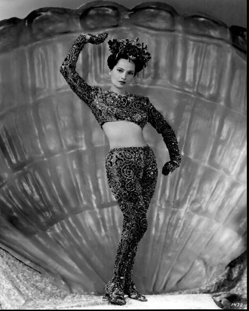 Merle Oberon black and white photo print wearing beaded outfit.