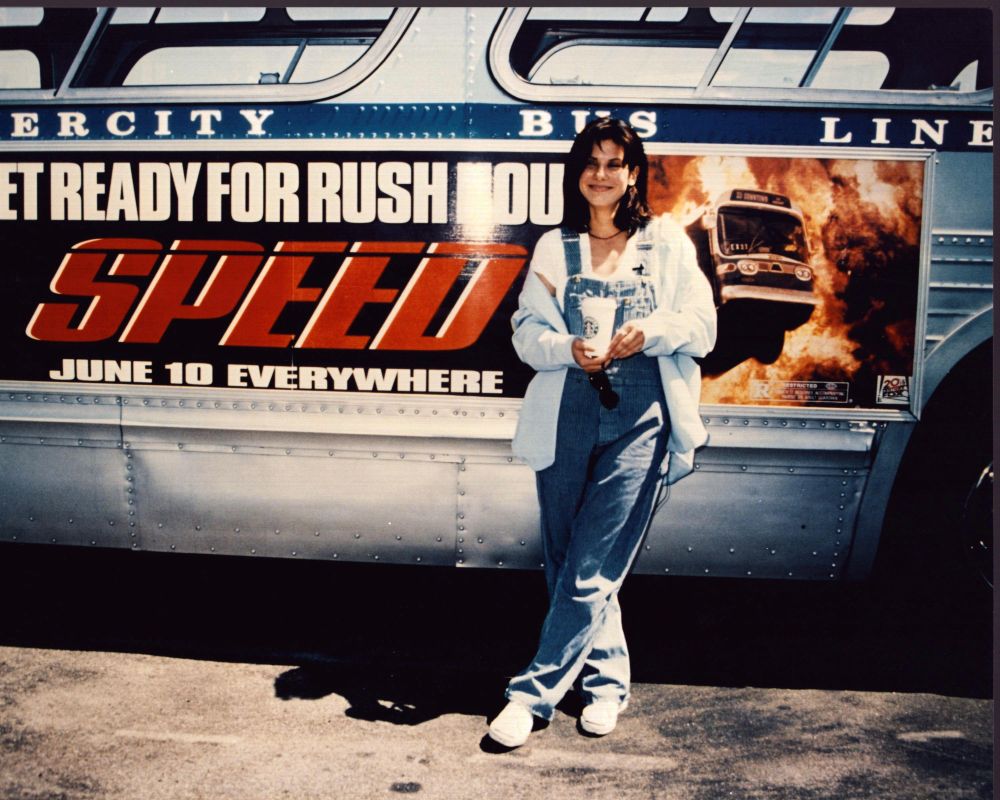 Sandra Bullock next to bus ad for Speed photo print