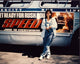 Sandra Bullock next to bus ad for Speed photo print