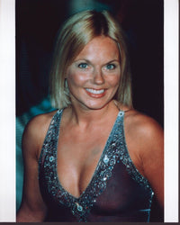 Geri Halliwell photo print in sheer and beaded top, vibrant colors.