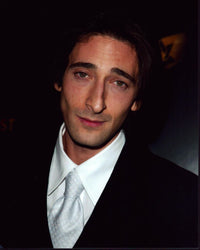 Adrien Brody in an elegant suit with a white tie photo print