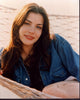 Liv Tyler in denim jacket relaxing on a hammock photo print.