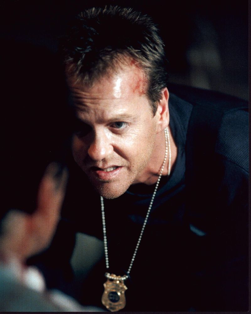 Kiefer Sutherland photo print with badge on chain, 8x10 size.