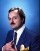 Peter Bowles photo print featuring a blue suit and yellow pocket square.