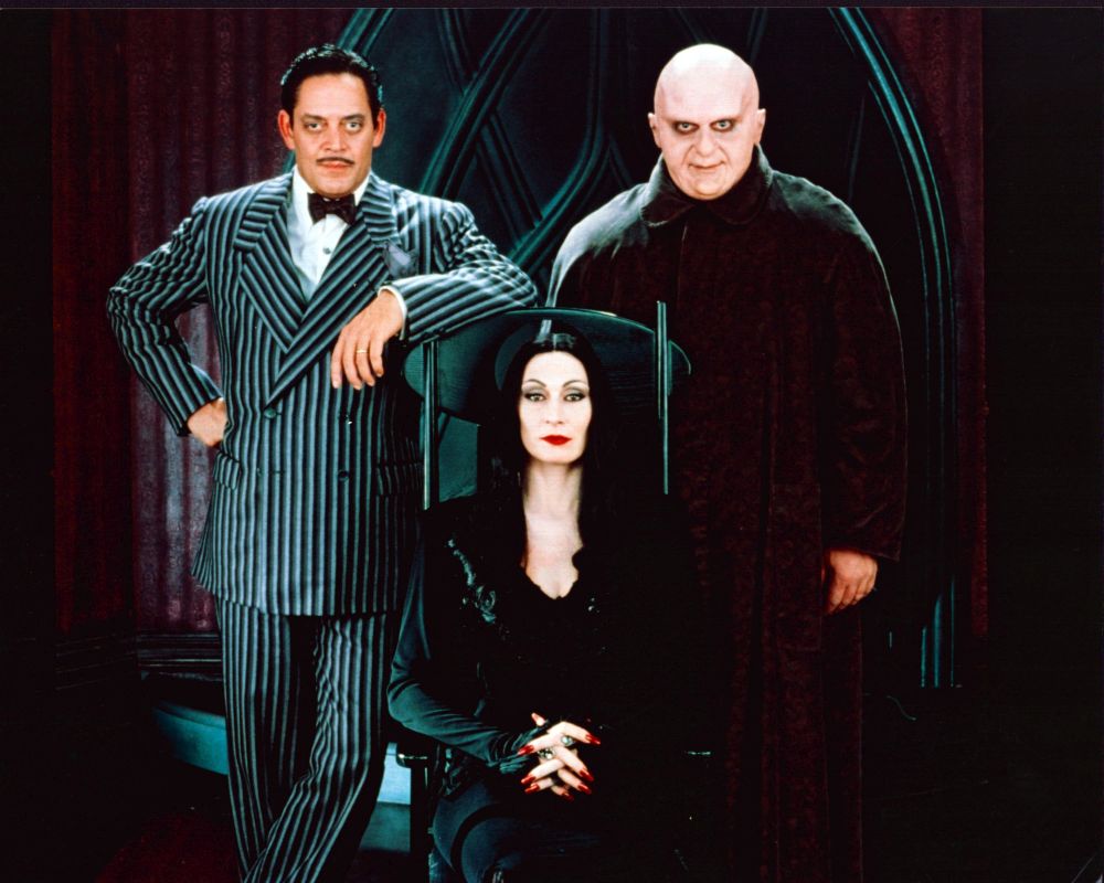 Raul Julia, Anjelica Huston, and Uncle Fester photo print from The Addams Family